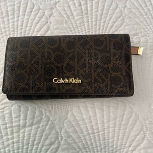 Authentic Calvin Klein wallet. Lots of room for credit cards etc. Great wallet